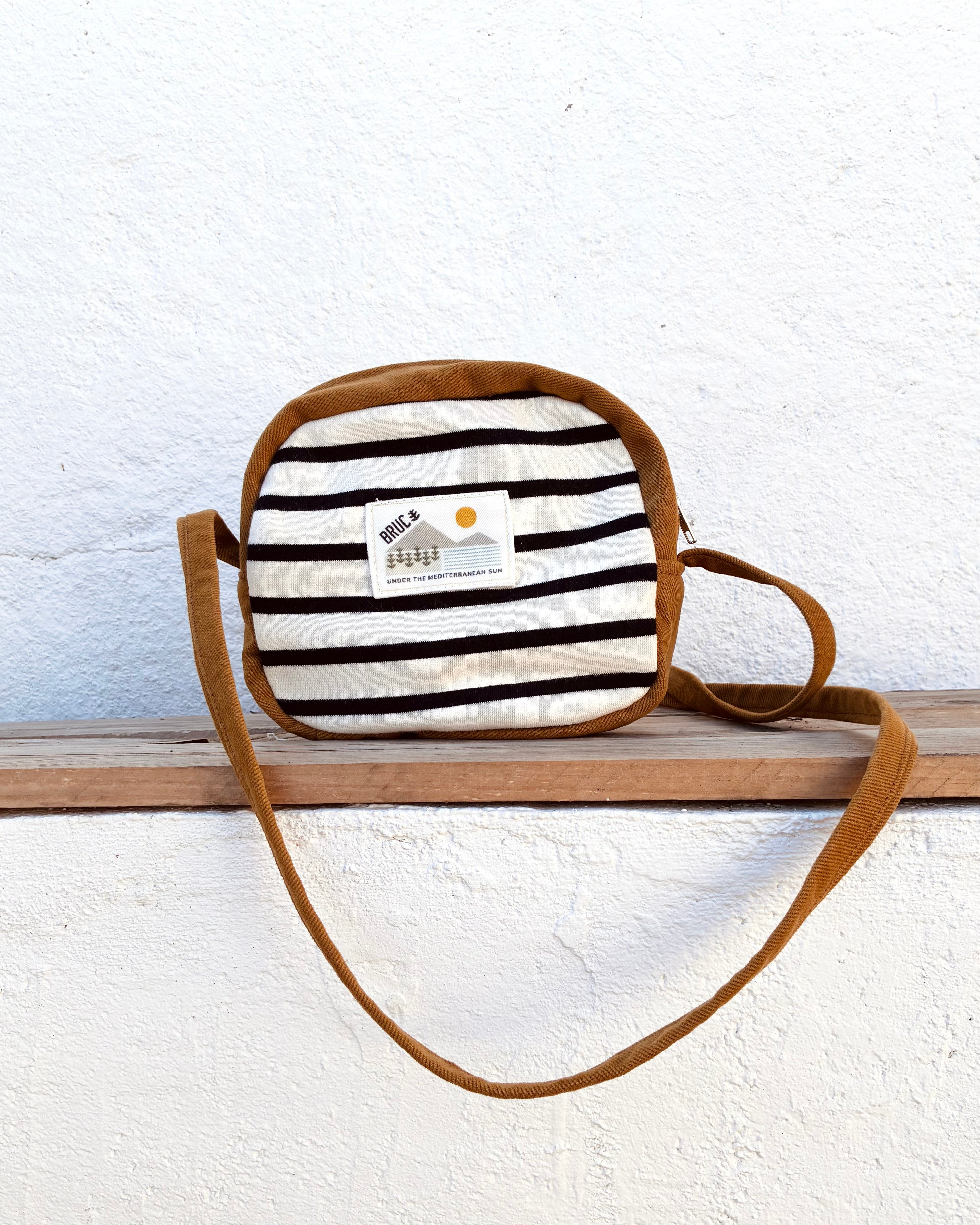 COMPACT CROSSBODY BAG · Autumn by the sea