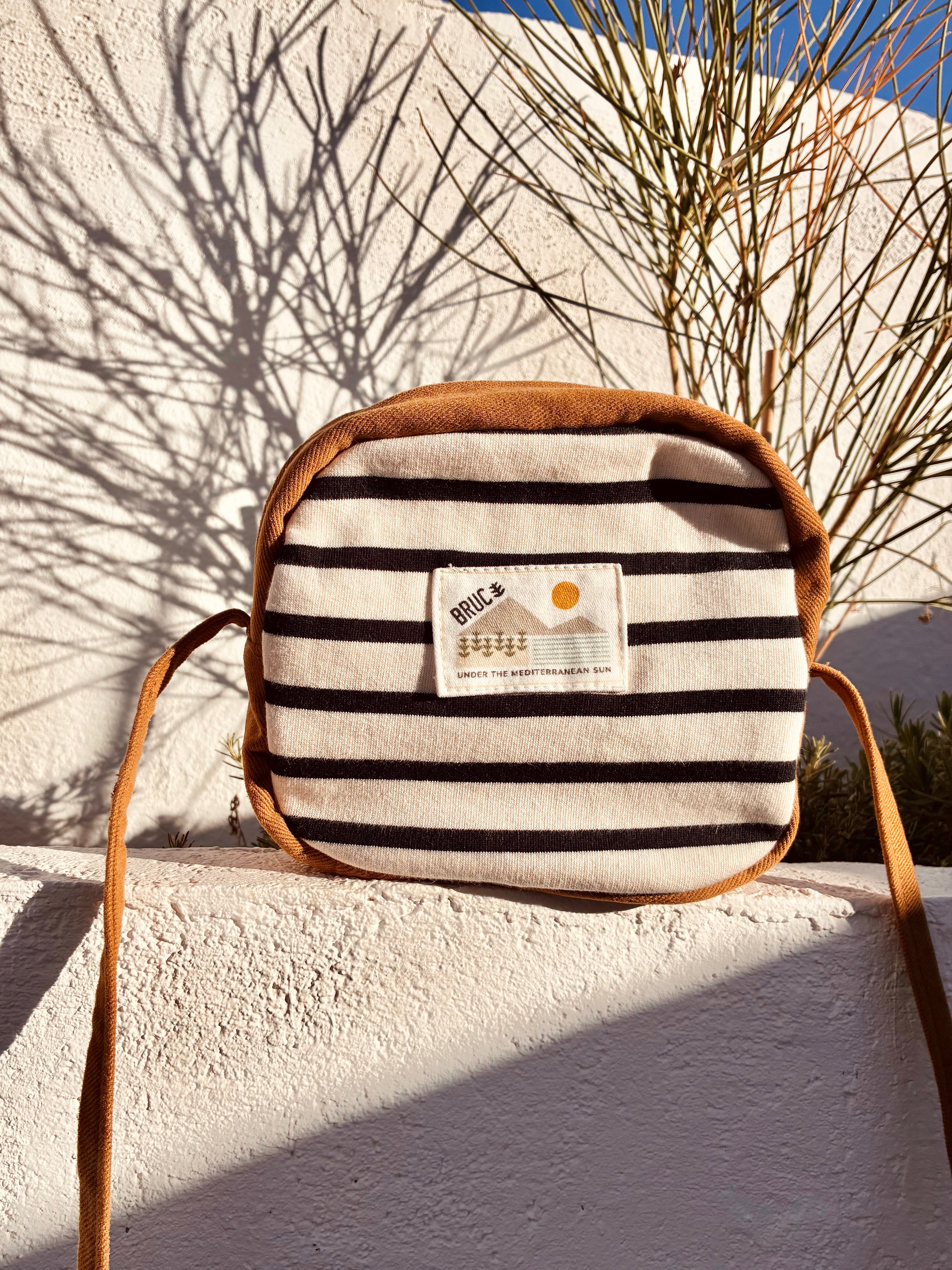 COMPACT CROSSBODY BAG · Autumn by the sea