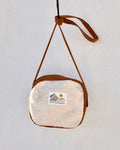 COMPACT CROSSBODY BAG · Sherpa's warmth