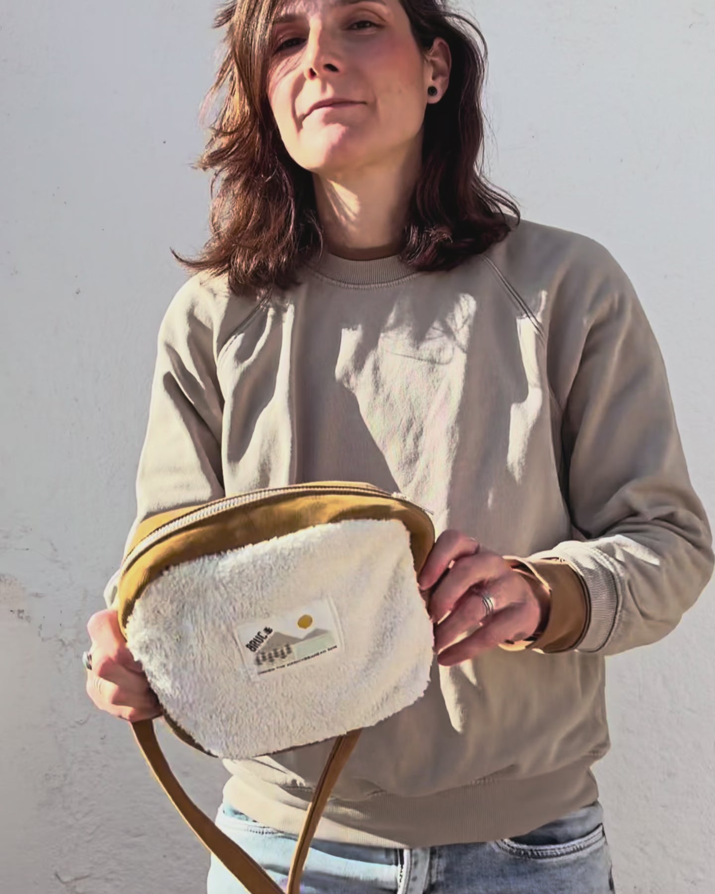 COMPACT CROSSBODY BAG · Sherpa's warmth